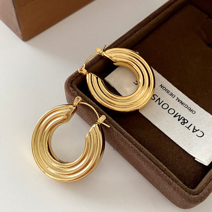 Boucles d'oreilles rondes en acier titane